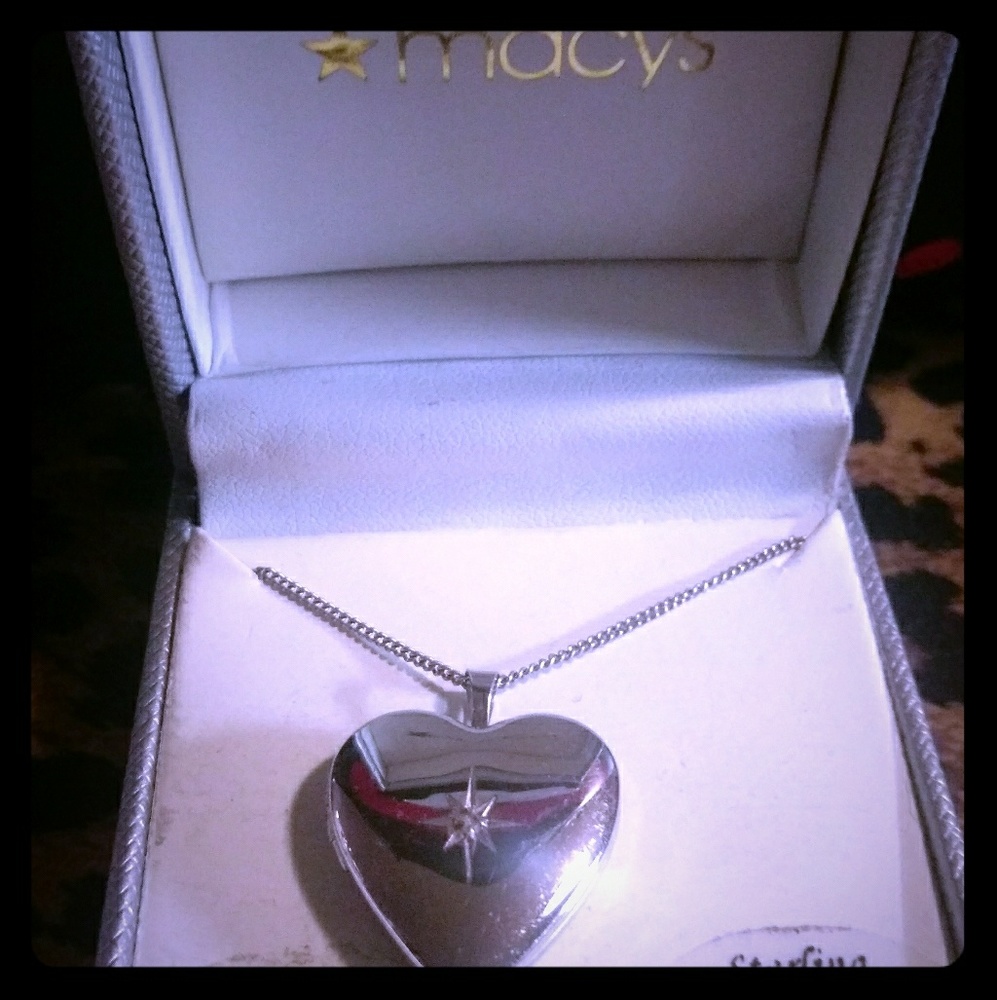 Sterling Silver locket with diamond accent